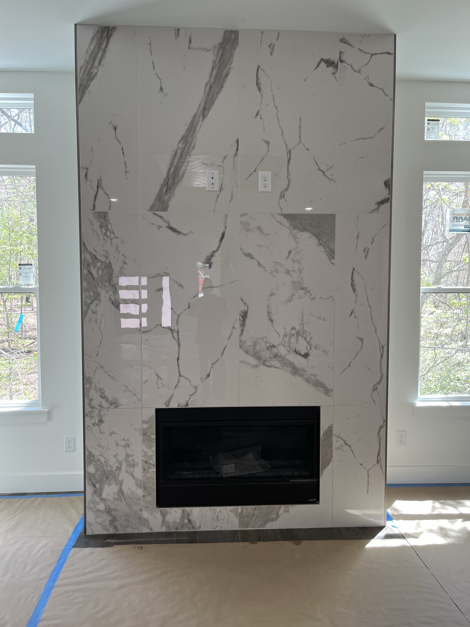 Fireplace tile installation by Natural State Tile