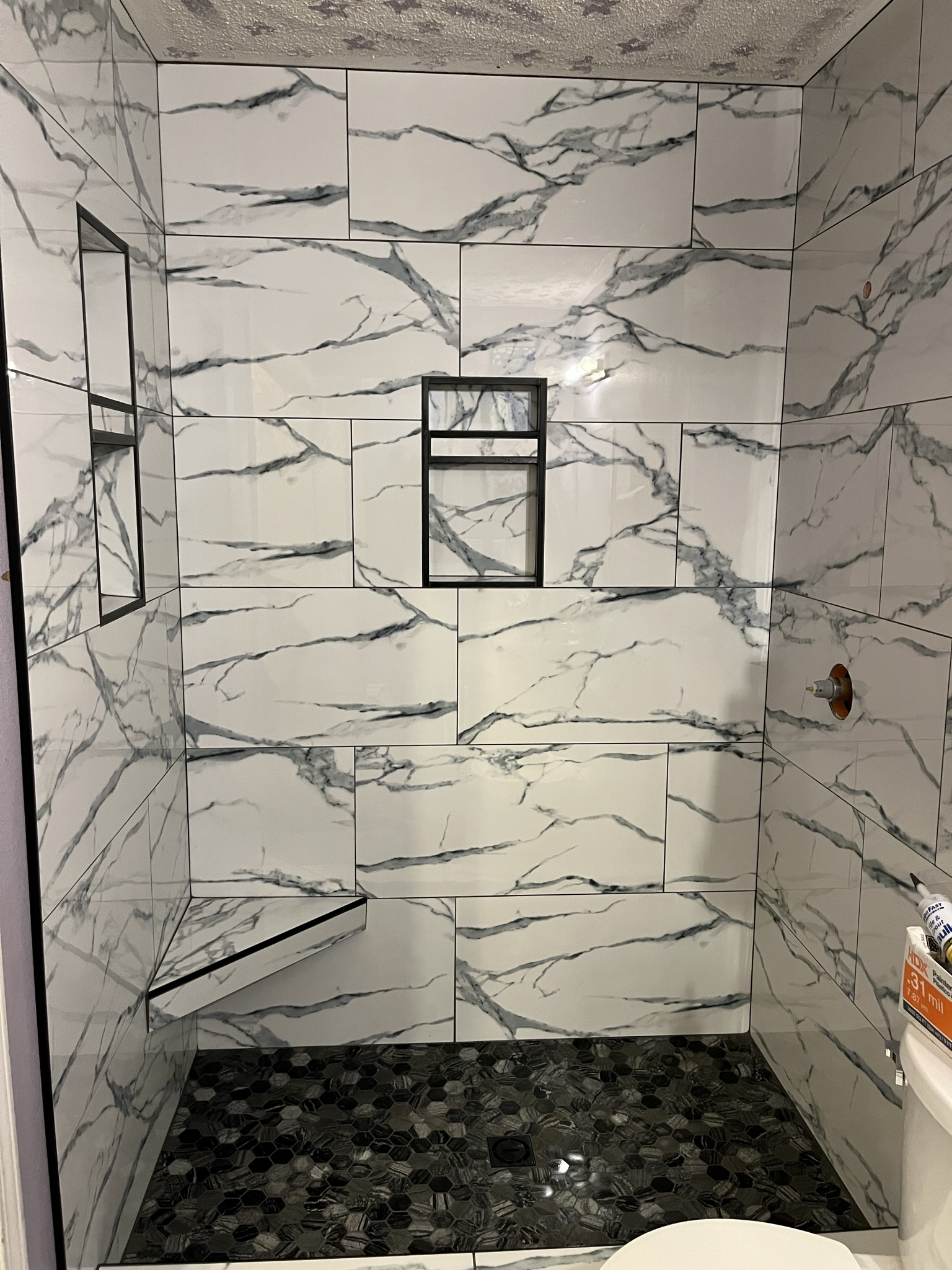 Bathroom tile installation with walk-in shower in Northwest Arkansas